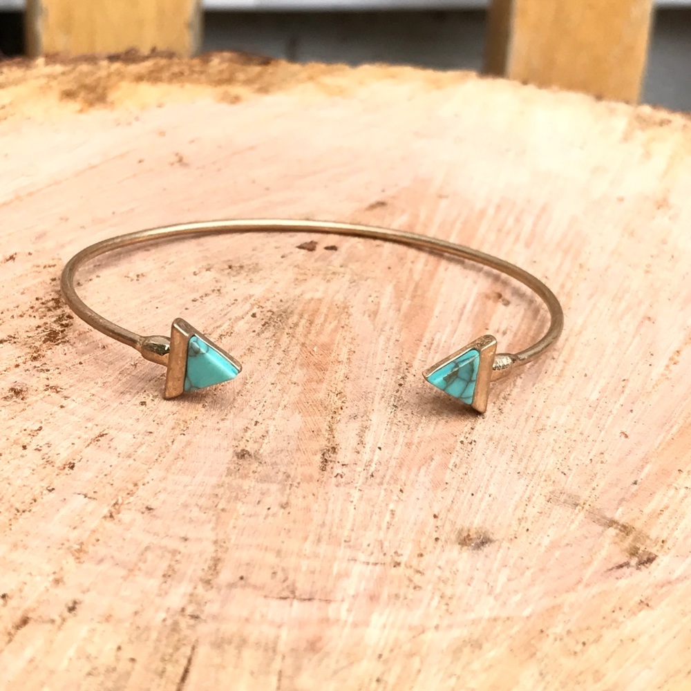 Open Wire Goldtone Double Triangle bracelet.